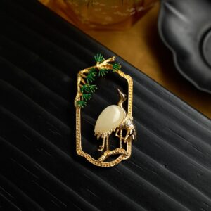 THE CRANE AND PINE LONGEVITY BROOCH