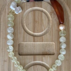handmade design featuring bridal crystals, golden gemstones, agate, and baroque pearls